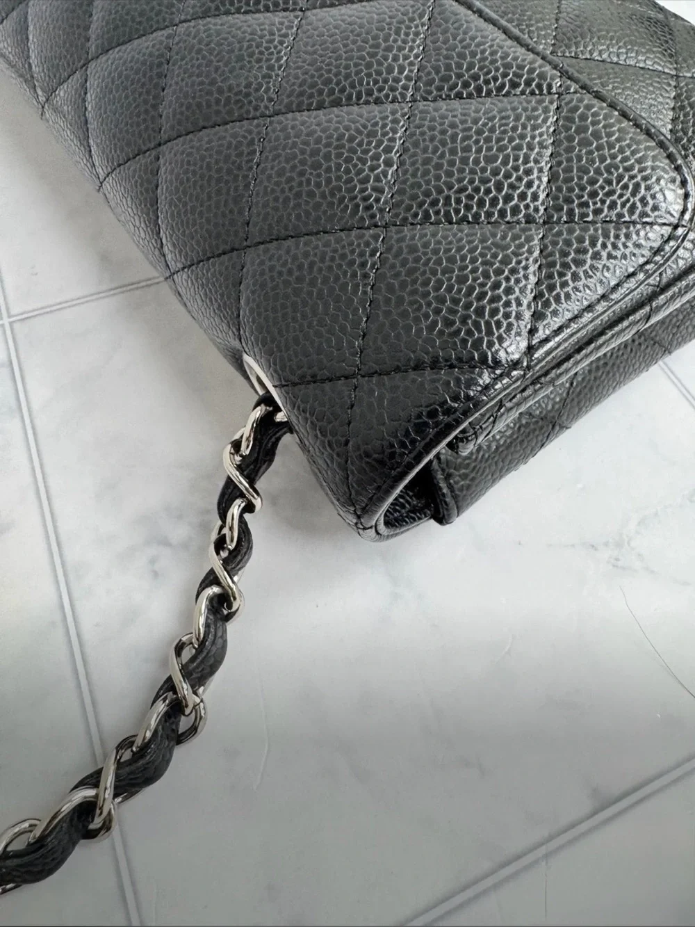 Chanel East West Flap in Caviar leather with dust bag.